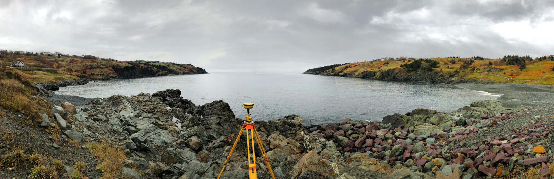 GNSS unit set up on a beach.